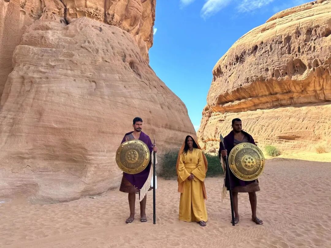 A posed photograph with costumed interpreters at the heritage site.