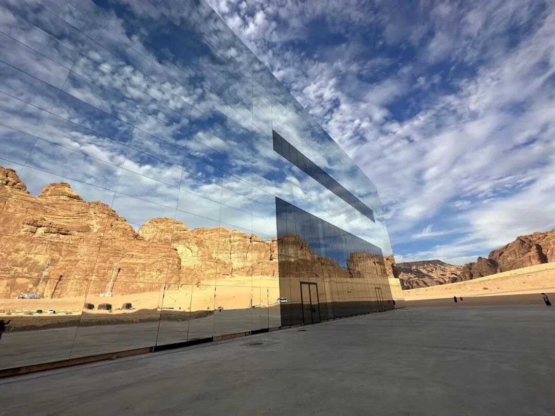 Maraya reflecting the sandstone landscape and sky, photographed during my visit.