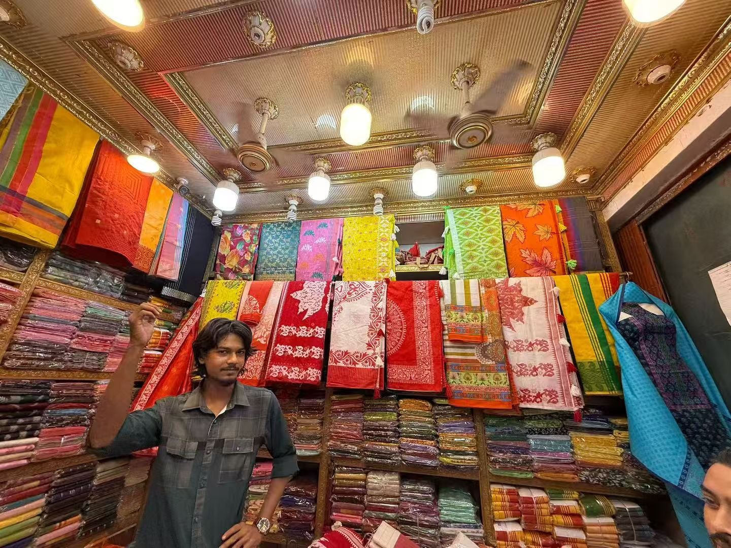 Fabrics displayed in a market shop.
