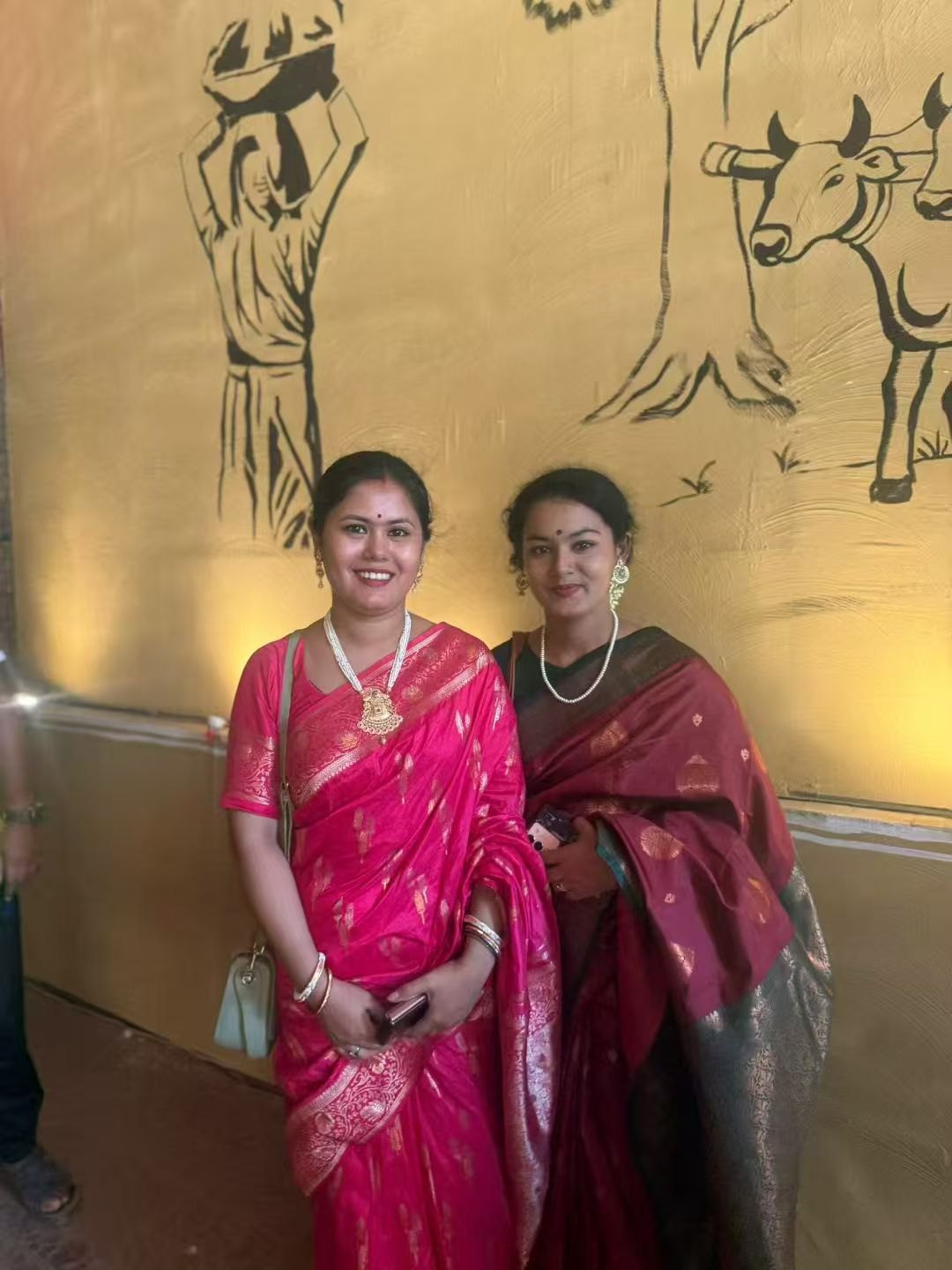 A photograph together in local dress during the journey.
