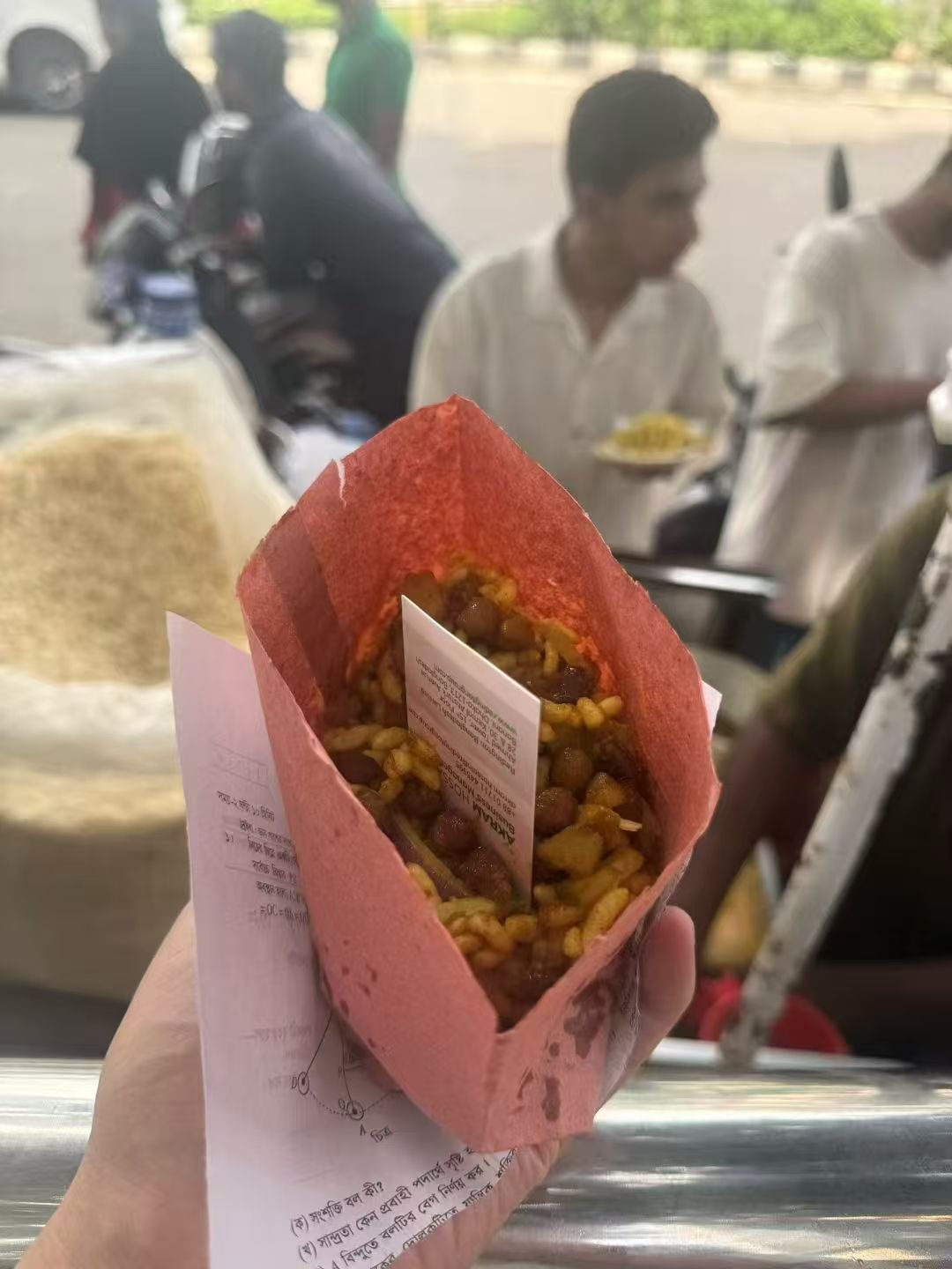 A street snack served in paper.