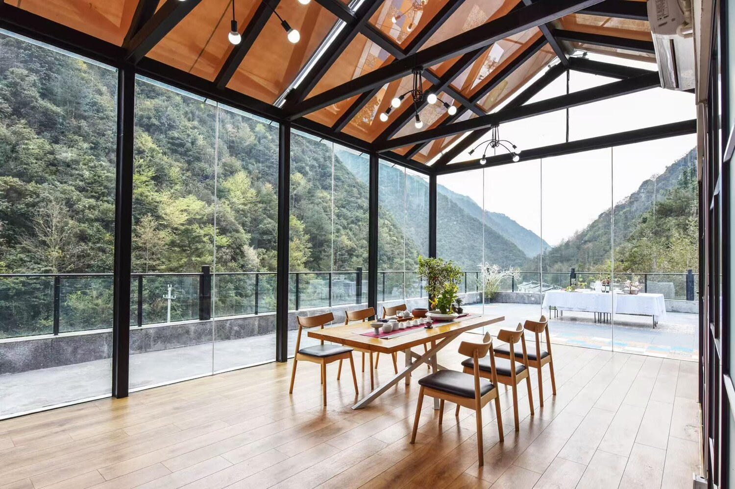 A mountain-facing dining space in the Garden Villa Collection photo archive.