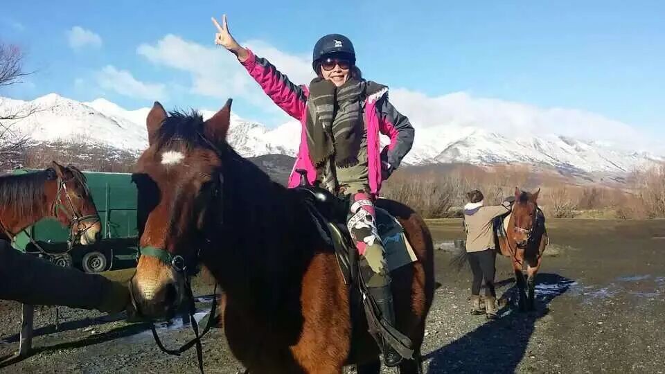 Horse riding in the valley.