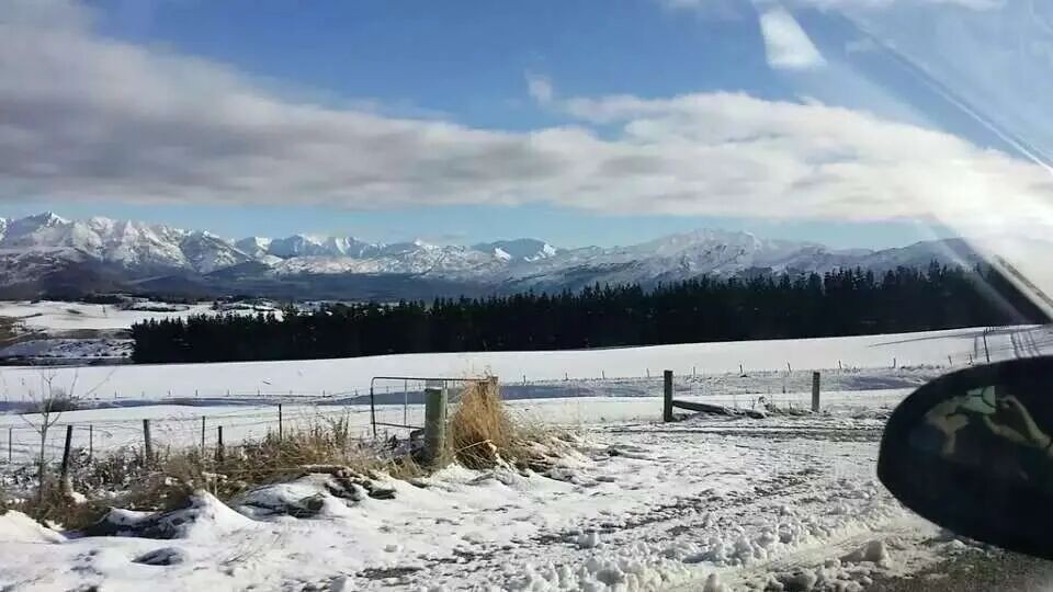 Lake and snowy mountains from the travel archive.